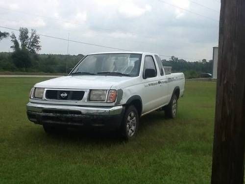 **no reserve** 1998 nissan frontier xe extended cab, runs and drives great