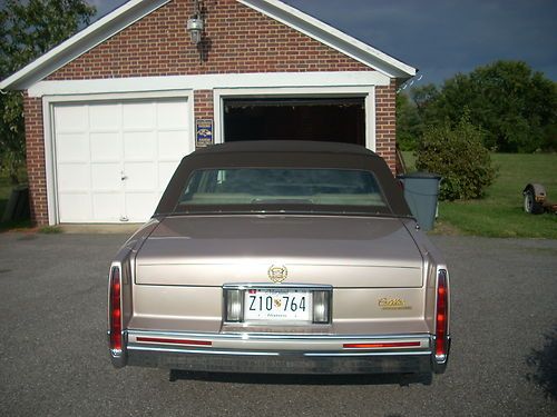 1991 cadillac deville base sedan 4-door 4.9l (like new) 24,053 miles