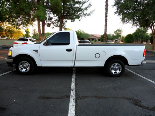 2000 ford f-150 triton 5.4l runs on cng or unleaded fuel  no reserve!!!!!