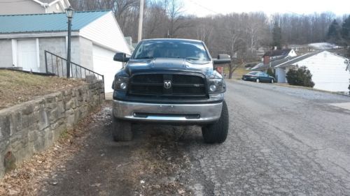 Dodge ram 1500 slt 5.7 black 6 inch lift 36 in tires