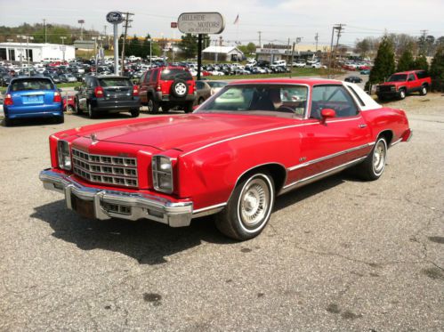 Red 1977 chevrolet monte carlo