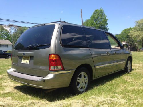 Ford windstar se remote power doors quad seats tv video original owner 80k miles