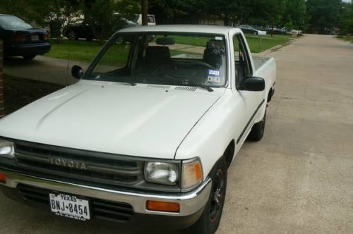1991 small toyota white truck automatic 4 cyl engine with ac  that works