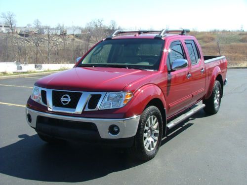 2009 nissan frontier le crew cab lwb 4wd, leather, low mileage, low reserve!