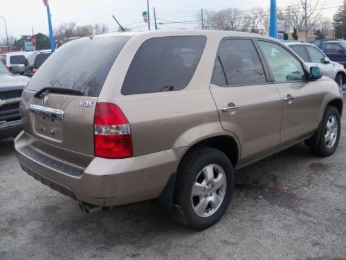 Suv, has a third seat,working a/c, a seat warmer, sunroof, and is light brown
