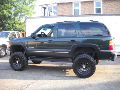 2003 chevrolet tahoe ls  original paint lifted with 35inch tires low miles nice