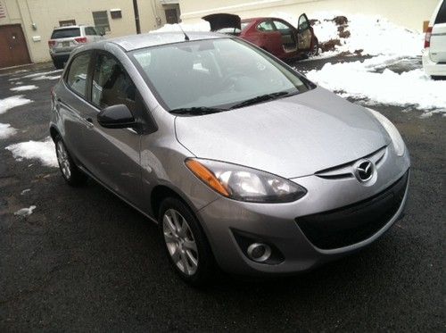 2012 mazda 2 sport drives and runs 100% gas saver !!! 24k no reserve must go !!