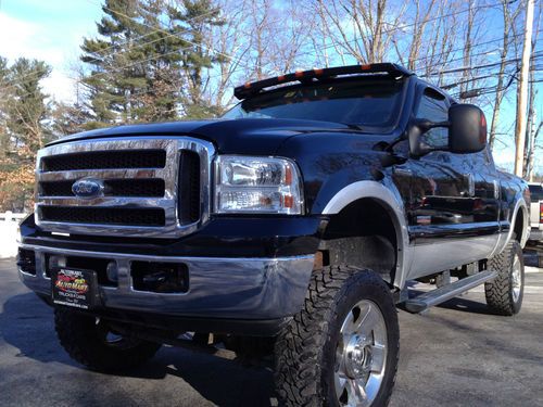 06 ford f350 super crew lariat 4x4. powerstroke turbo diesel, 65k, lifted