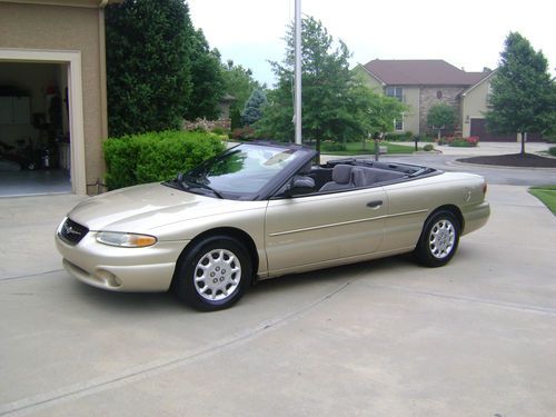 2000 chrysler sebring convertible with only 86k miles on it and a warranty!