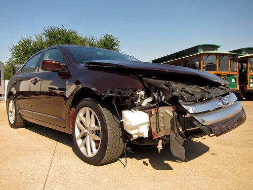 2012 ford fusion sel, leather, v6, cd changer, wrecked and rebuildable!