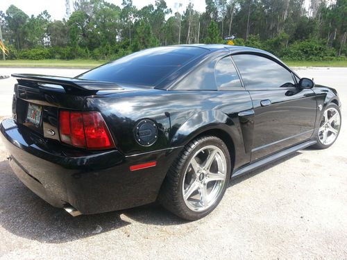 2004 black mustang gt with low miles, 5spd, perfect paint and perfect interior