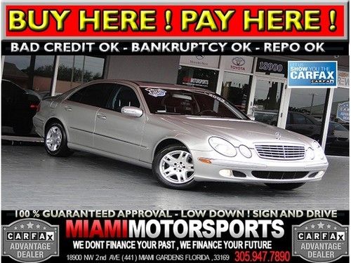 We finance '03 sedan low miles clean carfax sunroof leather alloy and more...