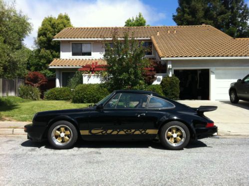 1975 porsche 911 carrera coupe 047 of 395 made coa black with gold script