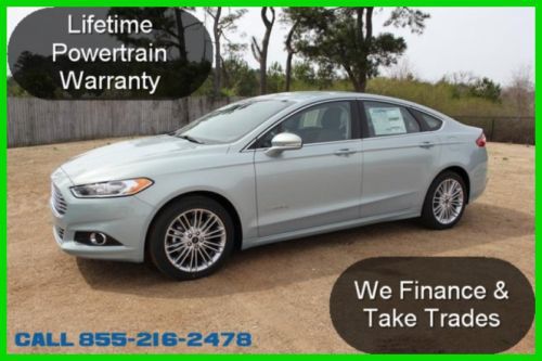 2014 se new fusion hybrid 44mpg rated. your gas savings will pay the payment