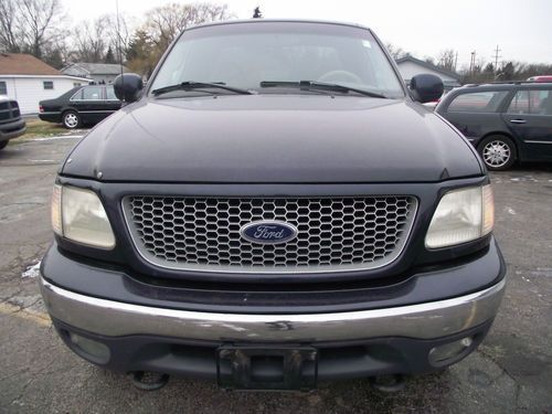 Ford f-150 lariat,4x4,extended cab,leather,needs engine work,no reserve.