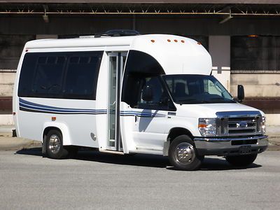 10 e350 15 passenger shuttle bus low miles satellite tv gas like new 15 seater