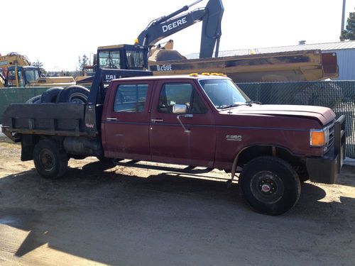 7.3 idi, rugby 6x9 flatbed, custom hd bumper, zf-5 manual trans, dana 60 front.