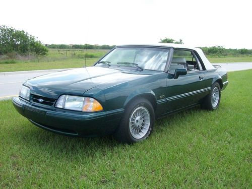 Lx convertible,5.0. 5 speed, dark green mettalic