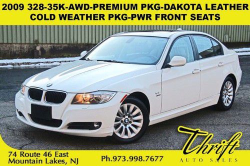 2009 328-35k-awd-premium pkg-dakota leather-cold weather pkg-pwr front seats