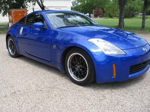 2004 nissan 350z  2-door/passenger 3.5l 6 speed dvd player &amp; subwoofer speakers