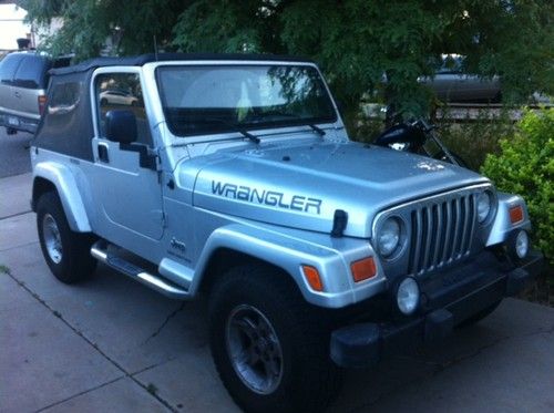 2006 jeep wrangler unlimited, i-6, six speed manual new all-terrain a/t tires