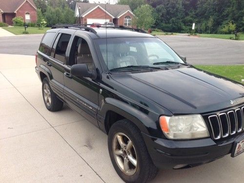 2001 jeep grand cherokee limited v8 low reserve