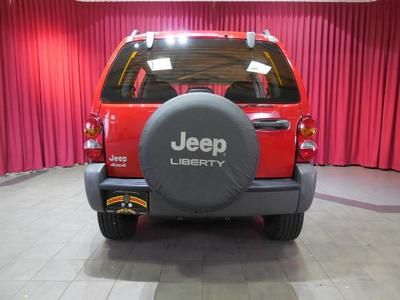 4dr Sport 4W Manual SUV 2.4L CD 4X4 4-Wheel Disc Brakes AM/FM Stereo, image 7