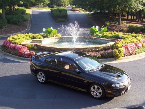 Near flawless phantom black 2005 pontiac gto low miles upgraded suspension