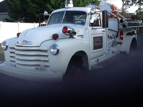 1949 chevy five window truck ( stella m.o. fire dept. first engine)