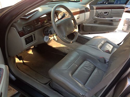 Used light brown luxurious power packed automatic sedan, clean. ready for highwy