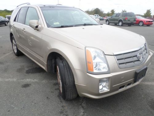 2005 cadillac srx it is awd it has clear title it needs engine work