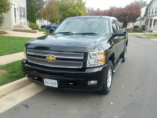 Black, automatice, less than 5000 miles, one owner, spray on bed liner, tool box