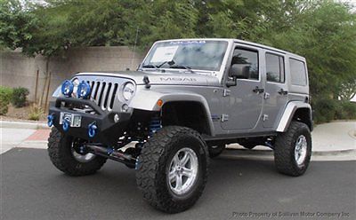 Moab bad boy lifted 2014 jeep wrangler unlimited moab with only 68 miles