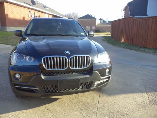 Beautiful black on tan leather 07 x5 4.8si  panoroof nav sport coldweather pkg