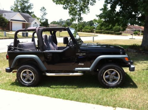 1997 jeep wrangler sport 4.0l with a/c.  150k miles  zero rust!  tj