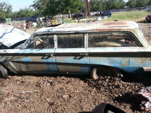 Blue pontiac tempest station wagon