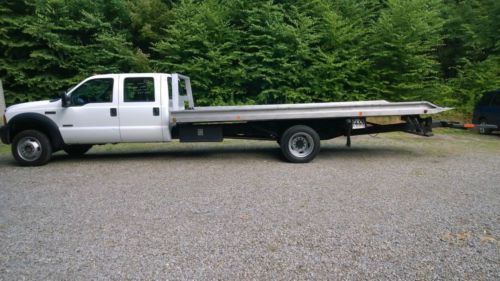 2006 ford f450 4x4 4 door rollback flatbed