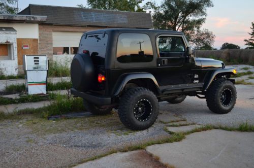 2003 jeep wrangler sahara sport utility 2-door 4.0l