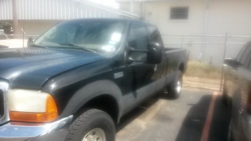 7.3 powerstroke diesel 4x4 black ext cab long bed meticulously maintained!