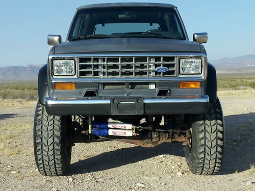 86 bronco ii, 5.0 auto, 9" lift on 37's     no reserve