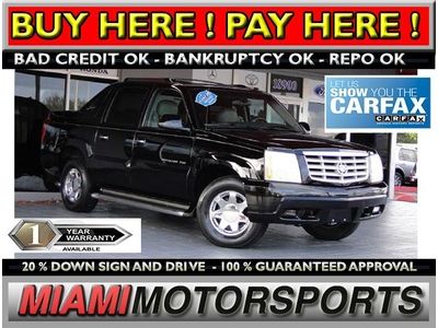 We finance 02 escalade ext cd abs brakes a/c alloy wheels am/fm/cd leather