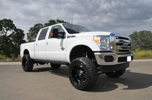 2012 ford f-250 super duty xlt crew cab 4x4 7-in. lift 22" fuel rims 37" toyo