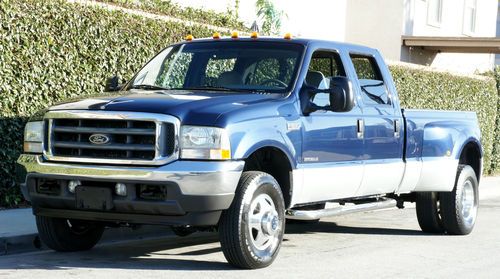 Crew cab long bed dually 7.3l powerstroke diesel lariat 77k miles