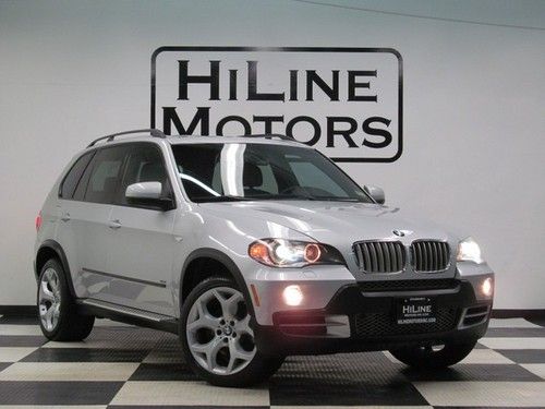 Navigation*heated seats*camera*dvd player*3 rd row saeating