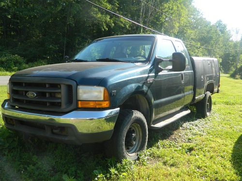 Super duty 4x4 ext cab 8ft utilty bed   no reserve!!!