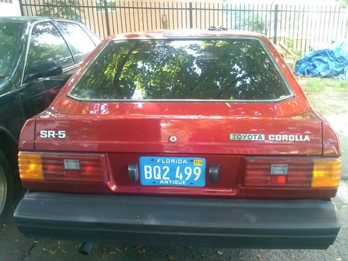 1982 toyota corolla sr5 hatchback 3-door 1.8l can red dark tint custom interior