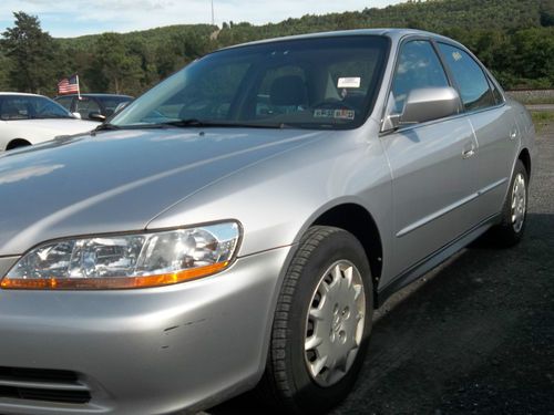 2001 honda accord lx sedan 4-door 2.3l  only 59k with trany  slips.............