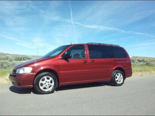 2002 red oldsmobile silhouette fully loaded leather heated seats w/ snow tires!