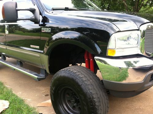 2004 ford f-250 super duty lariat  lifted, low mileage
