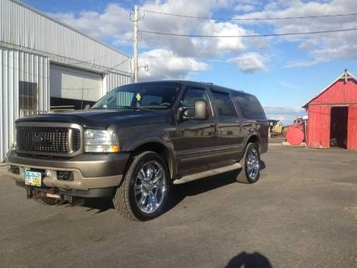 2004 ford excursion limited 6.0l diesel. super low miles.